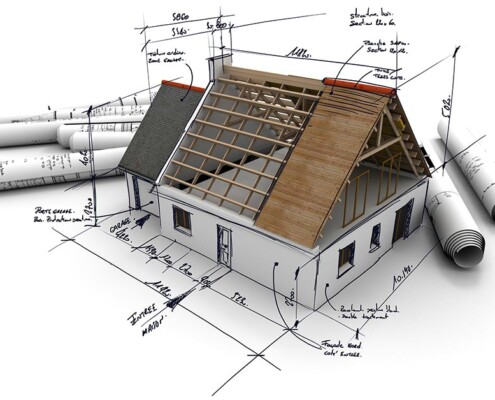 auf einer Grundrisszeichnung steht ein Modellhaus, daran befinden sich Skizzen und Notizen, im Hintergrund liegen weitere Baupläne | Haus bauen oder Haus kaufen